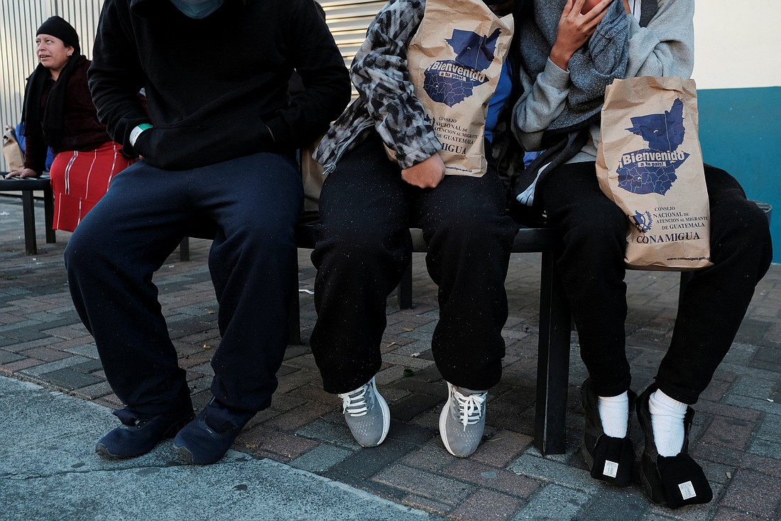 Migrants are seen outside a repatriation center in Guatemala City, Guatemala, after arriving on a deportation flight from the U.S. that landed at La Aurora Air Base Jan. 27, 2025. (OSV News/Josue Decavele, Reuters)