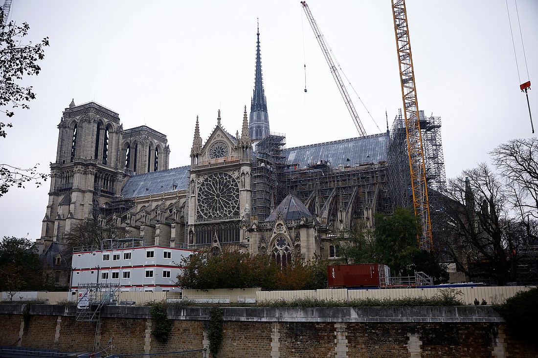 Cranes are seen around the Notre Dame Cathedral in Paris Nov. 7, 2024. The iconic cathedral, which was ravaged by fire in 2019, officially reopened Dec. 8. Restoration of the cathedral "is a powerful example of just how essential sacred spaces are to humanity," Catholic Extension said in a recent article on its website about the more than 13,000 churches the Chicago-based nonprofit has helped restore or rebuild in U.S. mission dioceses. It anticipates supporting 40 more sacred spaces in 2025. (OSV News photo/Sarah Meyssonnier, Reuters)