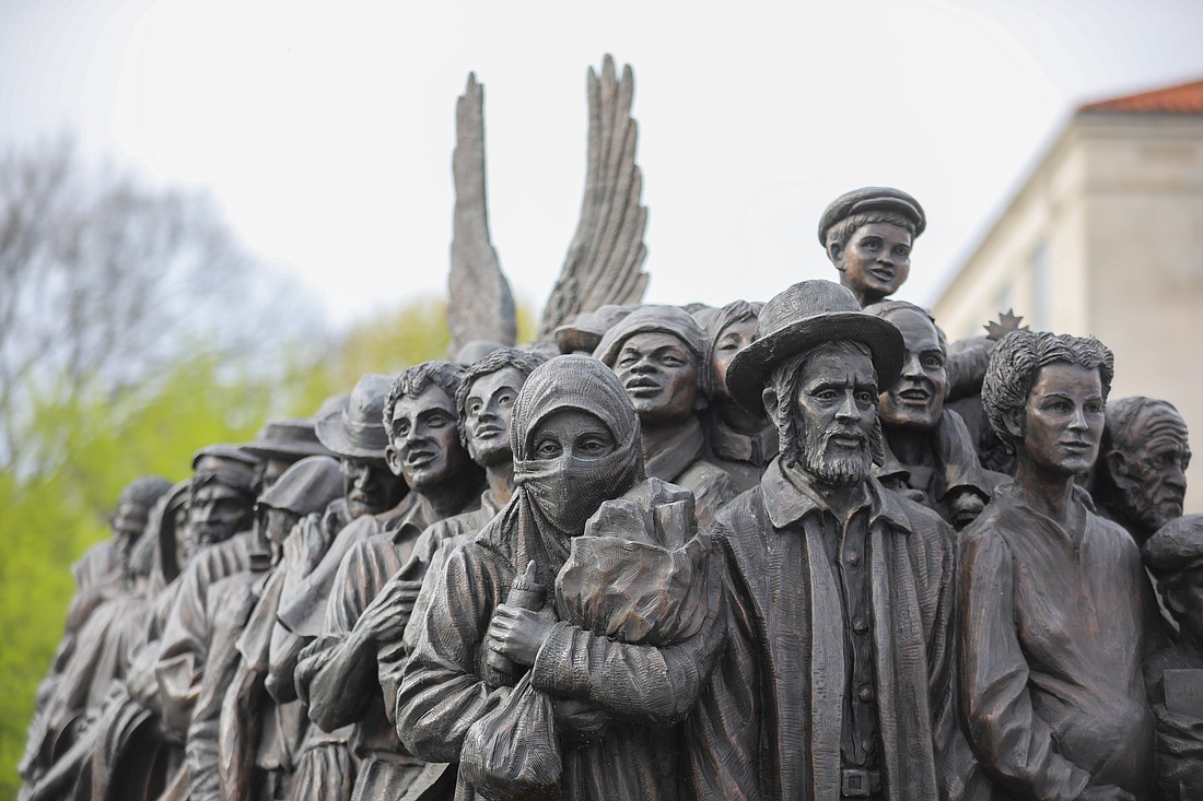 The sculpture "Angels Unawares" is seen at The Catholic University of America in Washington April 22, 2022. The life-size sculpture, which depicts a group of migrants and refugees crowded on a boat, is a replica of the original one Pope Francis unveiled in St. Peter's Square at the Vatican during the 2019 World Day of Migrants and Refugees. (OSV News/CNS file, Andrew Biraj, Catholic Standard)