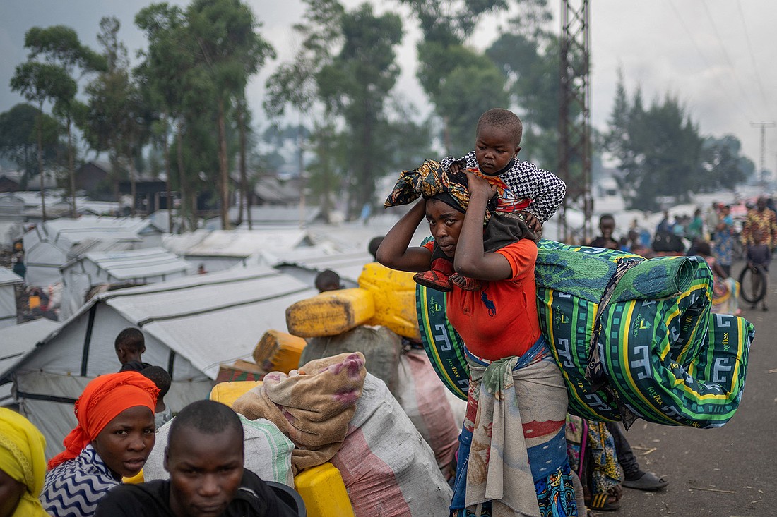 Congolese people displaced by recent clashes between the M23 rebels and the armed forces of the Democratic Republic of the Congo prepare to leave a camp Feb. 12, 2025, and return home after being instructed by the M23 rebels to vacate camps on the outskirts of Goma, Congo. (OSV News photo/Reuters)