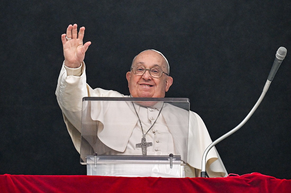 Pope Francis is shown greeting visitors in St. Peter's Square who gathered to pray the the Angelus Jan. 5, 2025. The Holy Father has been hospitalized with bronchitis and pulmonary difficulties since Feb. 14. On Feb. 18, he was diagnosed with bilateral pneumonia. CNS photo/Vatican Media