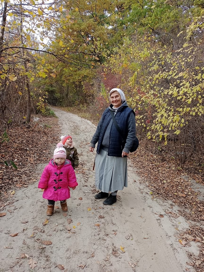 Polish Orionine Sister Renata Jurczak, pictured with Ukrainian children in an undated photograph, has been in Ukraine for 30 years. With their initiatives, the sisters bring back the purpose of life to farmers, mothers and children. (OSV News photo/courtesy Sister Victoria Andruschina)