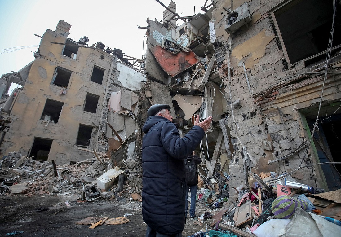 A local resident gestures outside a residential building in Kramatorsk, Ukraine, Feb. 2, 2022, which was destroyed by a Russian missile strike. (OSV News photo/Vyacheslav Madiyevskyy, Reuters)