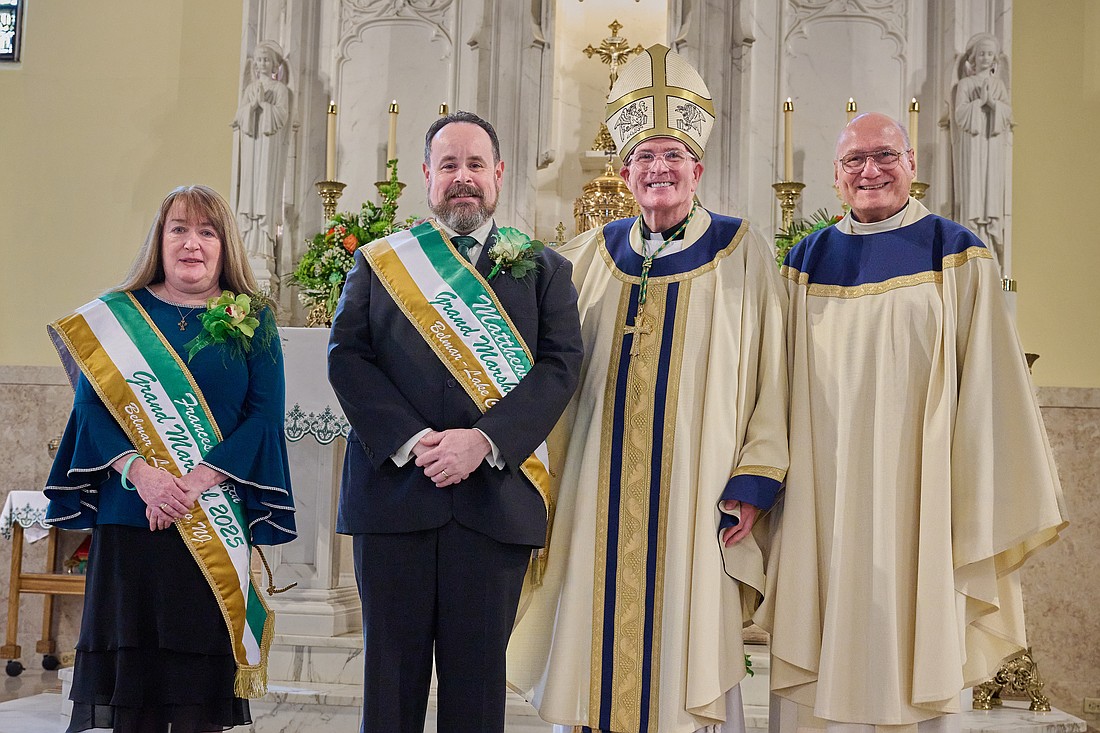 Bishop O'Connell and Msgr. Edward Arnister, pastor of St. Rose Parish, Belmar, pose for a photo with the 2025 Belmar & Lake Como St. Patrick's Day Grand Marshals Fran Griffin and Matthew Lee. Mike Ehrmann photo