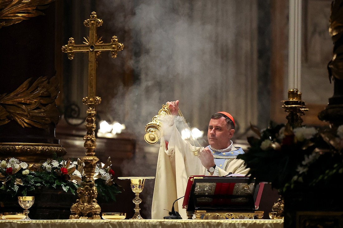 Cardinal Rolandas Makrickas, coadjutor archpriest of the Basilica of St. Mary Major in Rome, uses incense at the altar while celebrating Mass in the basilica after opening its Holy Door on the feast of Mary, the Holy Mother of God, Jan. 1, 2025. (CNS photo/Lola Gomez)
