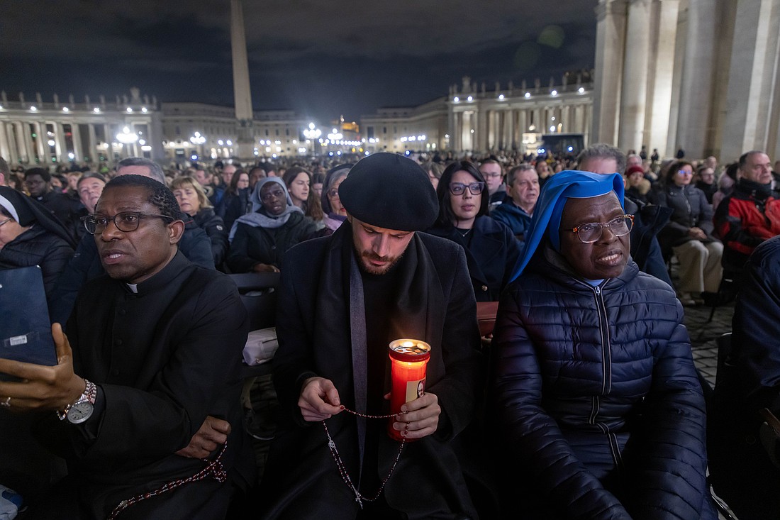 People join Cardinal Víctor Manuel Fernández, prefect of the Dicastery for the Doctrine of the Faith, for the recitation of the rosary for Pope Francis in St. Peter’s Square at the Vatican Feb. 28, 2025. Pope Francis has been hospitalized since Feb. 14 with double pneumonia. (CNS photo/Pablo Esparza)