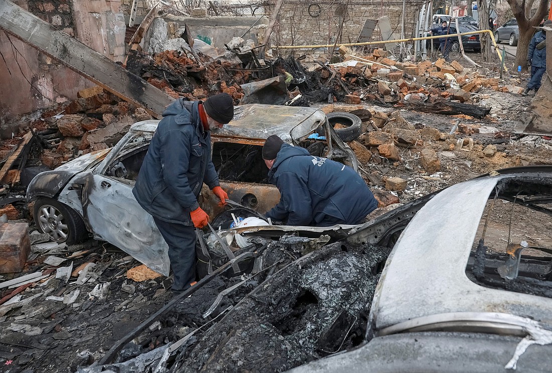 Residents are seen at a site of an apartment building in Odesa, Ukraine, March 4, 2025, hit by a Russian drone strike, amid Russia's attack on Ukraine. (OSV News photo/Nina Liashonok, Reuters)