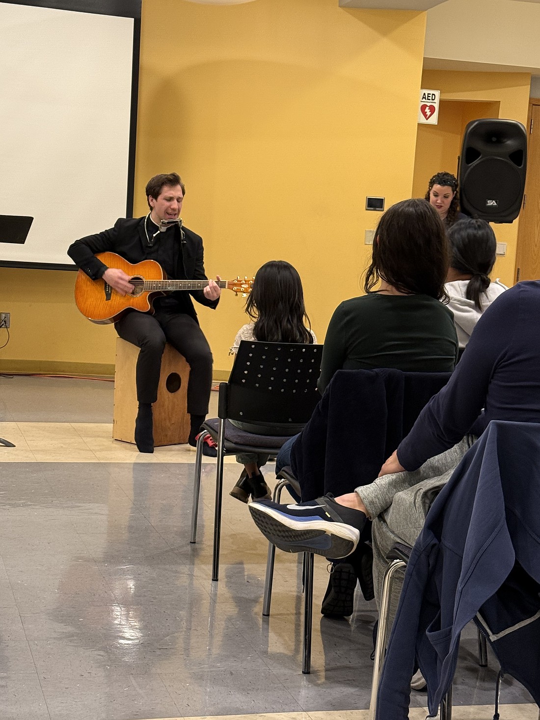 Father David Michael Moses, priest for the Archdiocese of Galveston-Houston, Texas, inspires and entertains those who came for his Feb. 26 presentation in St. Paul Parish, Princeton. Jennifer Mauro photo