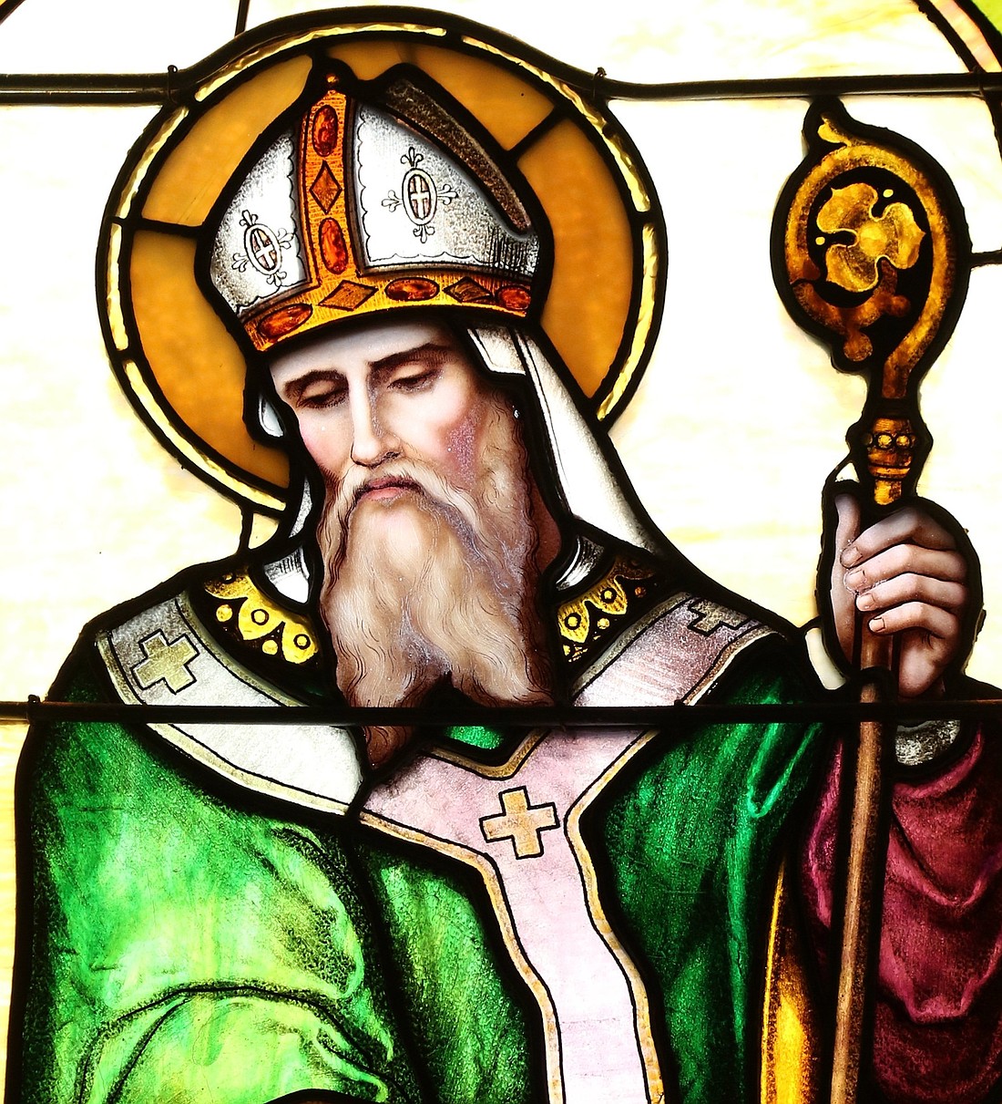 St. Patrick, patron of Ireland, is depicted in a stained-glass window at St. John of God Church in Central Islip, N.Y. in this undated file photo. (OSV News photo/Gregory A. Shemitz)