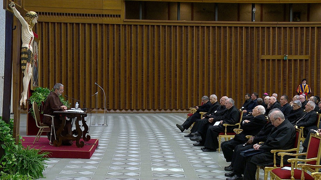 Capuchin Father Roberto Pasolini, preacher of the papal household, shares his meditation with members of the Roman Curia during their Lenten retreat in the Paul VI Audience Hall at the Vatican March 11, 2025. (CNS screengrab/Vatican Media)