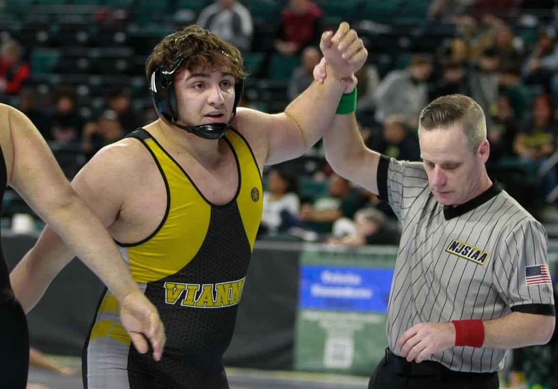 St. John Vianney senior Rocco Dellagatta celebrates with family and friends at Jim Whelan Boardwalk Hall March 8 after the heavyweight won his second straight state title. Contributed by Rocco Dellagatta