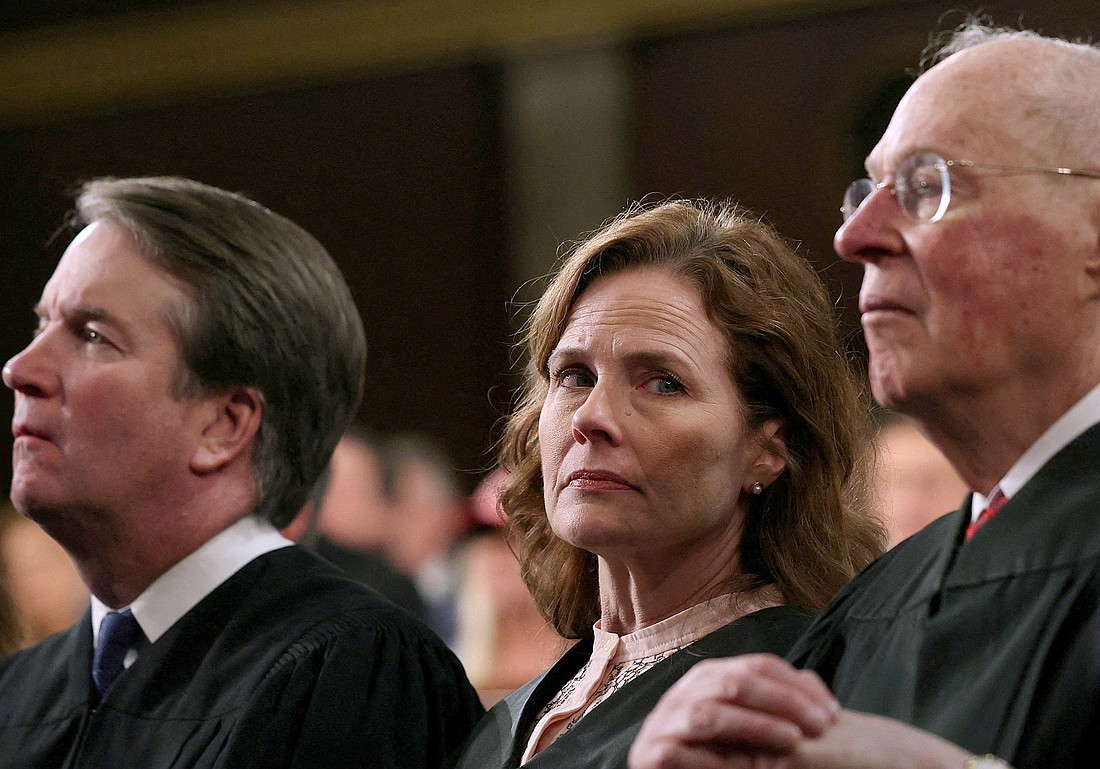 U.S. Supreme Court Justices Brett Kavanaugh and Amy Coney Barrett, and retired Justice Anthony Kennedy, attend President Donald Trump's address to a joint session of Congress at the U.S. Capitol in Washington March 4, 2025. Barrett's sister, Amanda Coney Williams, was the target of a bomb threat at her home in Charleston, S.C., earlier in March, local police say. The news comes at a time when members of the judiciary have faced threats of violence. (OSV News photo/Win McNamee, Pool via Reuters)