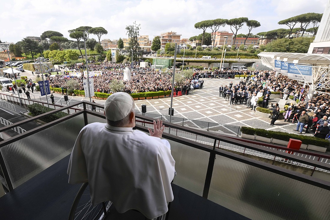 Pope Francis greets well-wishers at Rome's Gemelli hospital before returning to the Vatican March 23, 2025, after 38 days of treatment at the hospital. (CNS photo/Vatican Media)