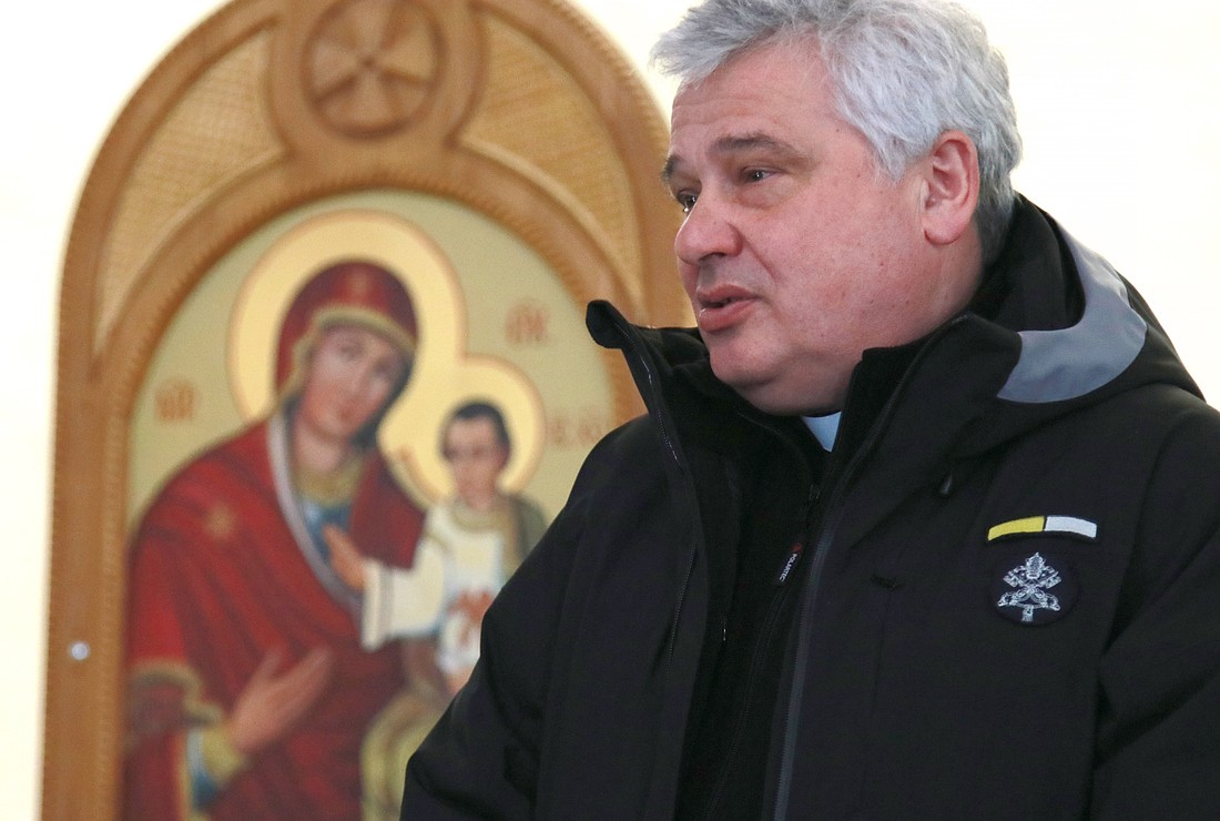 Cardinal Konrad Krajewski, the papal almoner, is pictured near a Marian icon during a visit with Ukrainian refugees in Lviv, Ukraine, in this March 10, 2022, file photo. (CNS photo/courtesy Ukrainian Catholic Church)
