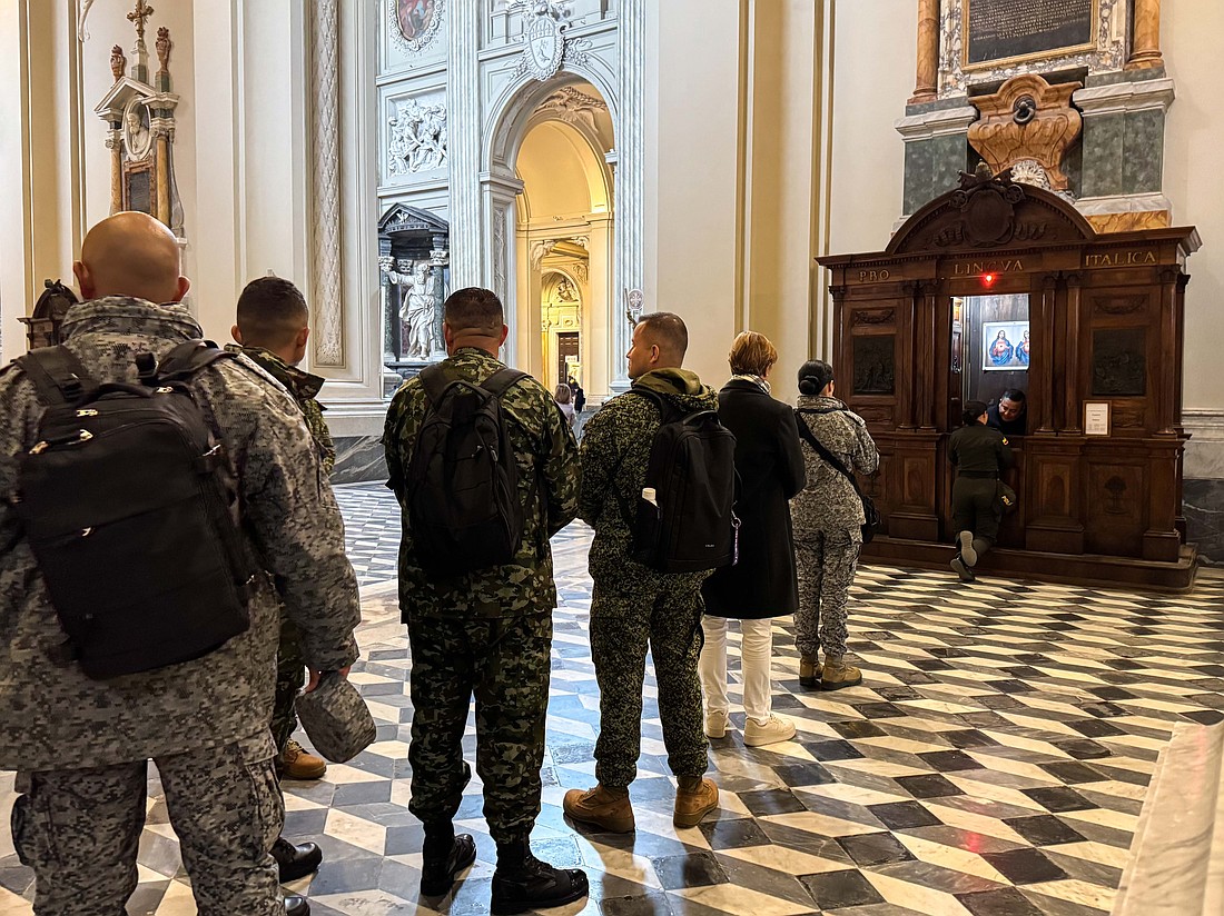 Members of the Colombian military stand in line for confession at Rome's Basilica of St. John Lateran Feb. 7, 2025. The soldiers were in Rome for the Jubilee of the Armed Services, Police and Security Personnel. (CNS photo/Cindy Wooden)