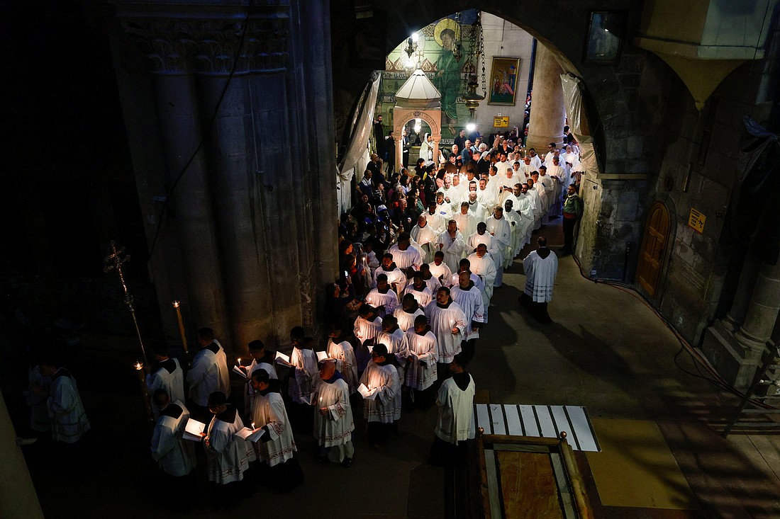 Members of the clergy take part in a procession during the washing of the feet ceremony on Holy Thursday in the Church of the Holy Sepulcher in Jerusalem's Old City April 17, 2025. (OSV News photo/Ammar Awad, Reuters).