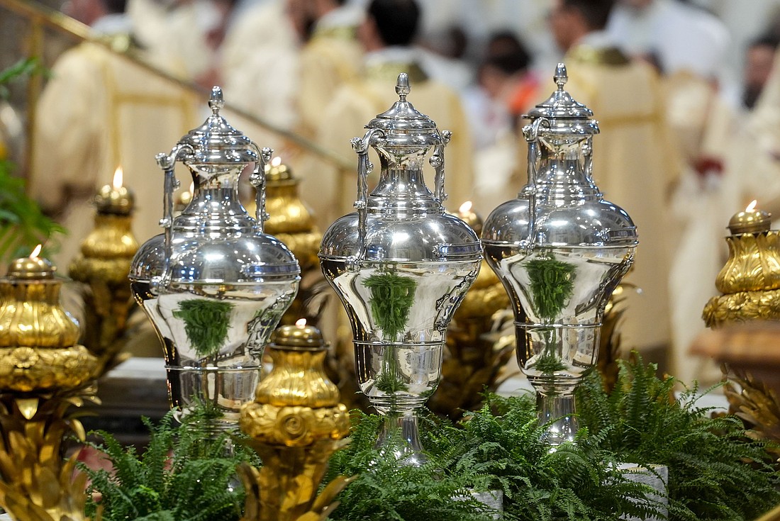 Silver vessels containing sacramental oils are displayed during the chrism Mass in St. Peter’s Basilica at the Vatican April 17, 2025. Cardinal Domenico Calcagno presided over the liturgy as Pope Francis’ delegate. (CNS photo/Lola Gomez)