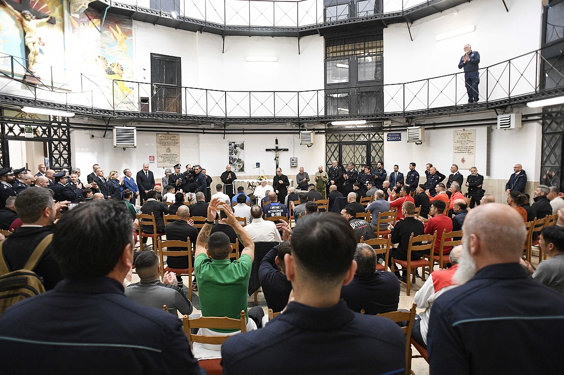 Pope Francis speaks to inmates during a Holy Thursday visit to Rome's Regina Coeli jail April 17, 2025. (CNS photo/Vatican Media)