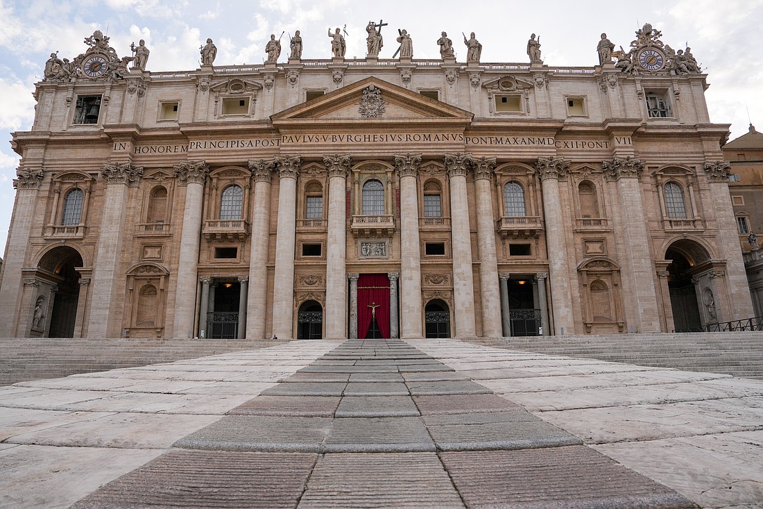 The steps of St. Peter's Basilica at the Vatican, with thousands of Easter flowers removed, is seen April 21, 2025, just before people begin praying the rosary for the repose of the soul of Pope Francis. (CNS photo/Lola Gomez)