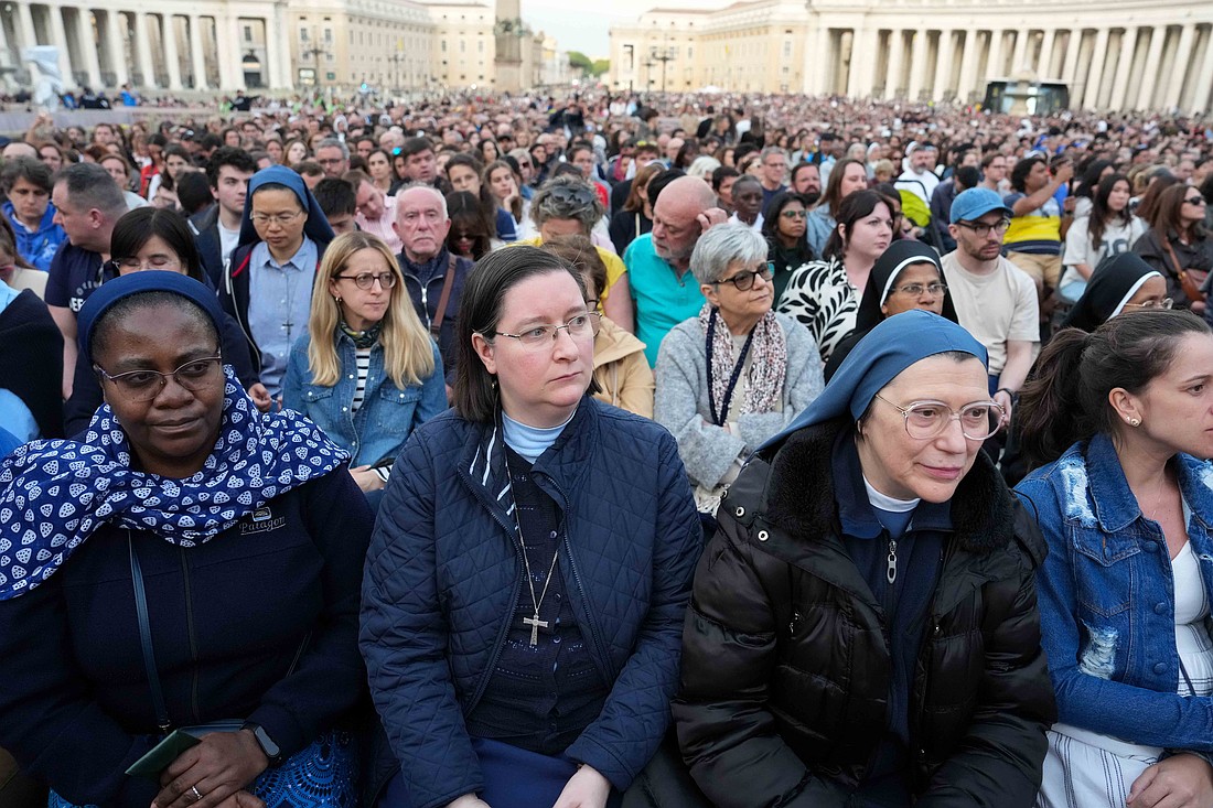 People gather in St. Peter’s Square to pray the rosary for the repose of the soul of Pope Francis at the Vatican April 21, 2025. The pope died earlier that morning at 7:35 a.m. local time. (CNS photo/Lola Gomez)