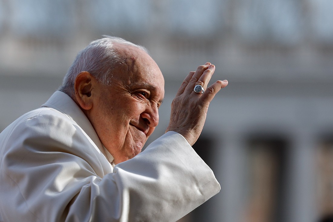 Pope Francis greets visitors from the popemobile as he rides around St. Peter's Square before his weekly general audience at the Vatican March 13, 2024. (CNS photo/Lola Gomez)