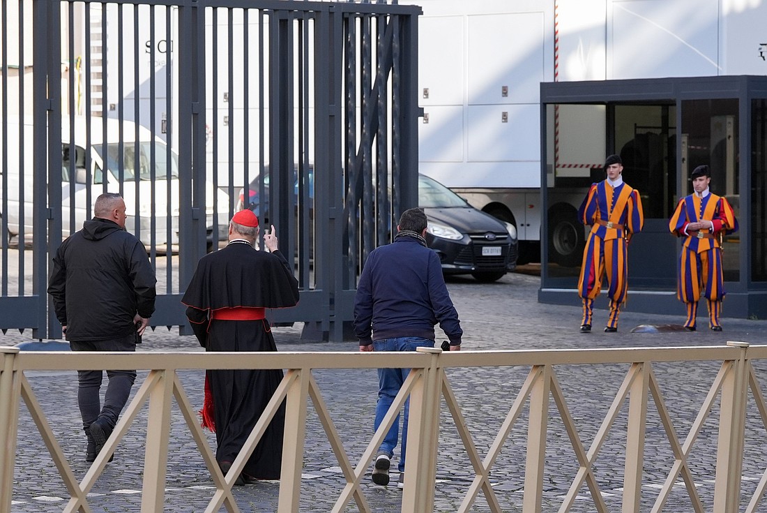 Retired Italian Cardinal Gianfranco Ravasi approaches the Petriano entrance next to St. Peter's Square to attend the first meeting of cardinals in the Synod Hall at the Vatican April 22, 2025. (CNS photo/Lola Gomez)