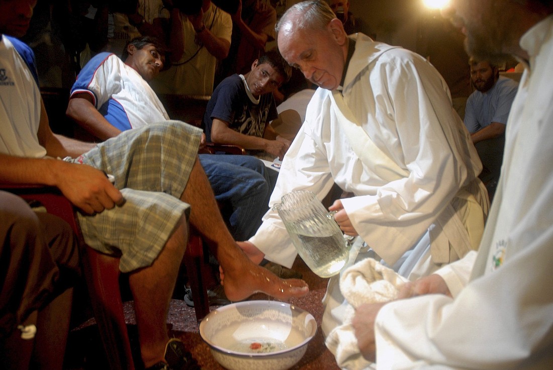 Argentine Cardinal Jorge Mario Bergoglio, since 2013 - Pope Francis, washes the feet of residents of a shelter for drug users during Holy Thursday Mass in 2008 at a church in a poor neighborhood of Buenos Aires, Argentina. Pope Francis died April 21, 2025, at age 88.  (OSV News photo/Enrique Garcia Medina, Reuters)