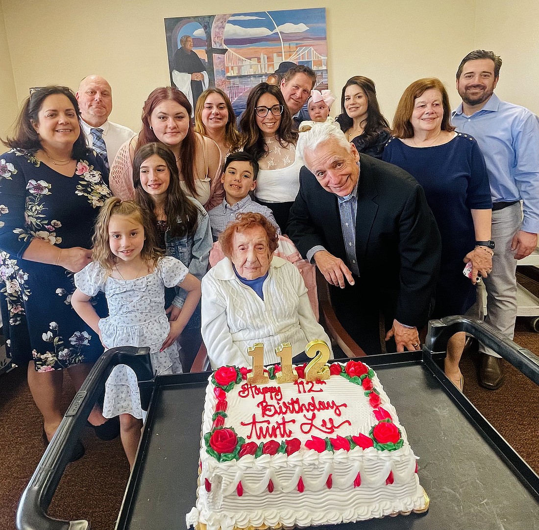 Sister Francis Dominici Piscatella, a member of the Sisters of St. Dominic of Amityville, N.Y., is joined by her family as she celebrates her 112th birthday, April 20, 2025, Easter Sunday, at the Dominicans' motherhouse. Sister Piscatella is the oldest religious sister in the U.S. (OSV News photo/courtesy Cynthia Piscatella Grimley)