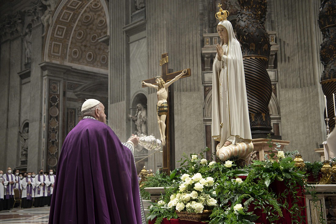 Pope Francis burns incense in front of a Marian statue after consecrating the world and, in particular, Ukraine and Russia to the Immaculate Heart of Mary during a Lenten penance service in St. Peter's Basilica at the Vatican March 25, 2022. A year later, he asked Catholics worldwide to renew the consecration and pray for peace. Pope Francis, formerly Argentine Cardinal Jorge Mario Bergoglio, died April 21, 2025, at age 88. (CNS photo/Vatican Media).