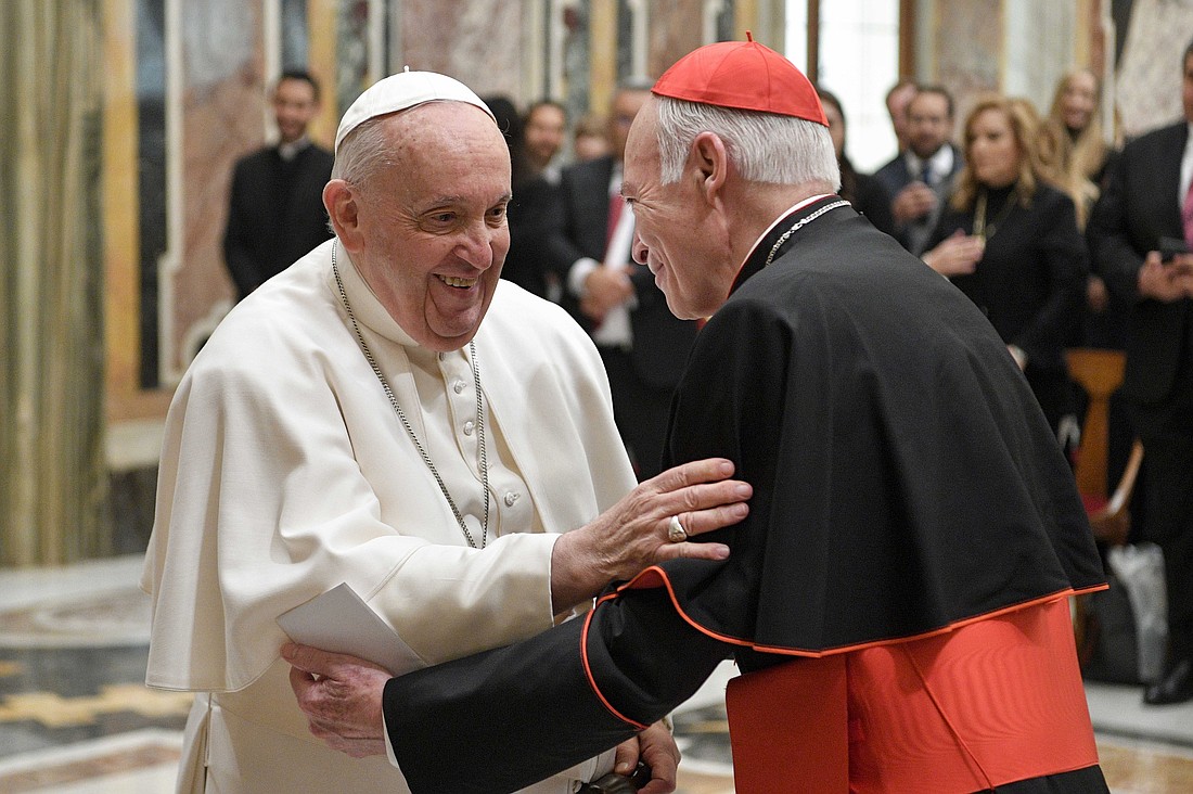 Pope Francis greets Cardinal Carlos Aguiar Retes of Mexico City during a meeting with entrepreneurs from Mexico at the Vatican Feb. 17, 2023. (CNS photo/Vatican Media)