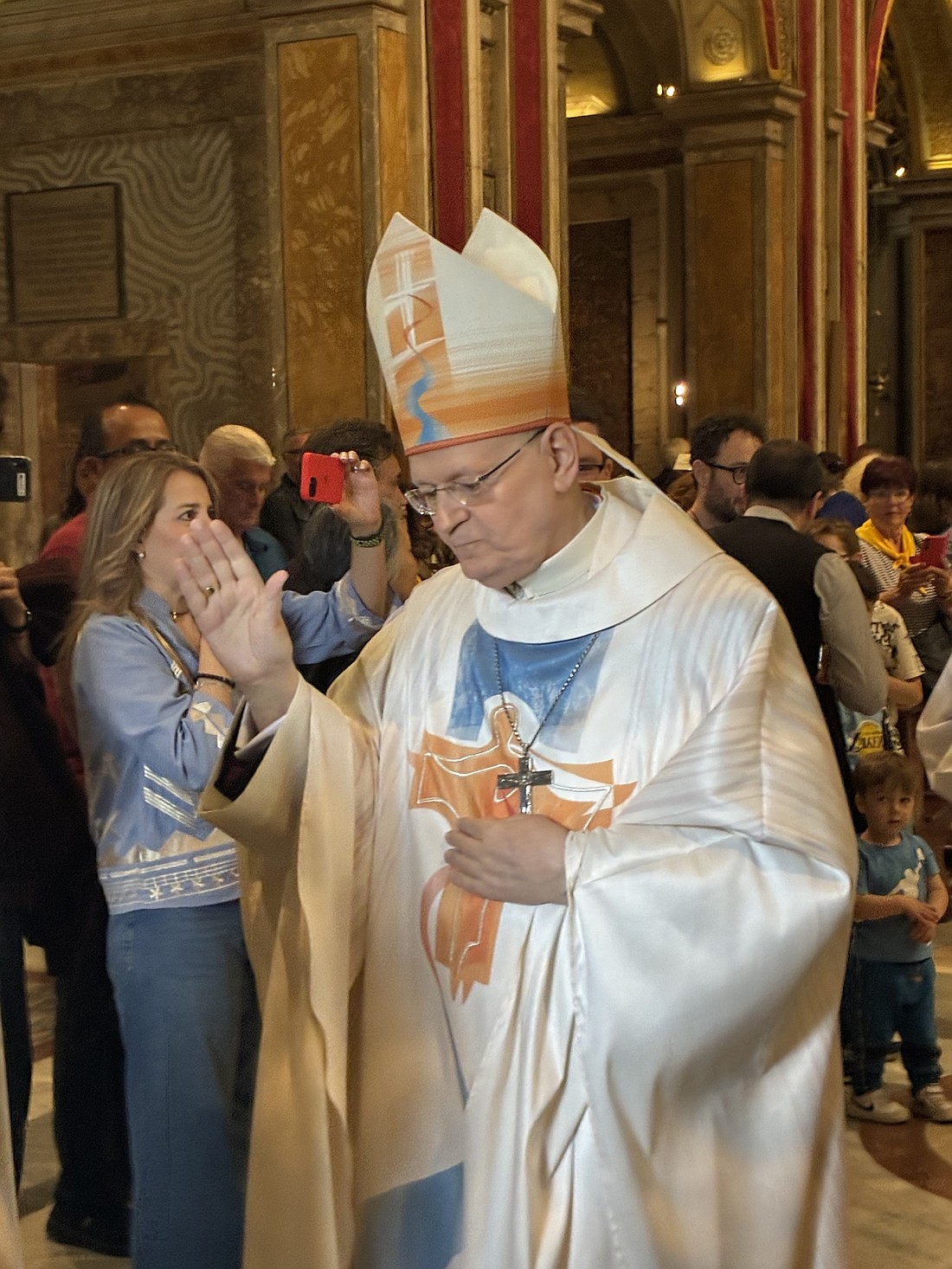 Hungarian Cardinal Péter Erdö, 72, archbishop of Esztergom-Budapest, blesses  the faithful as he processes out of Mass at his church of Santa Maria Nuova, also known as the Basilica of Santa Francesca Romana, in the Roman Forum May 4, 2025. (OSV News photo/Michael R. Heinlein)