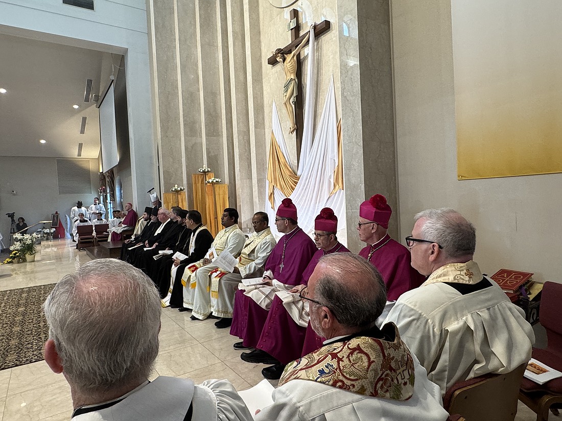 Faith leaders from around the state and beyond participate in the prayer service from the sanctuary. Marianne Hartman photos