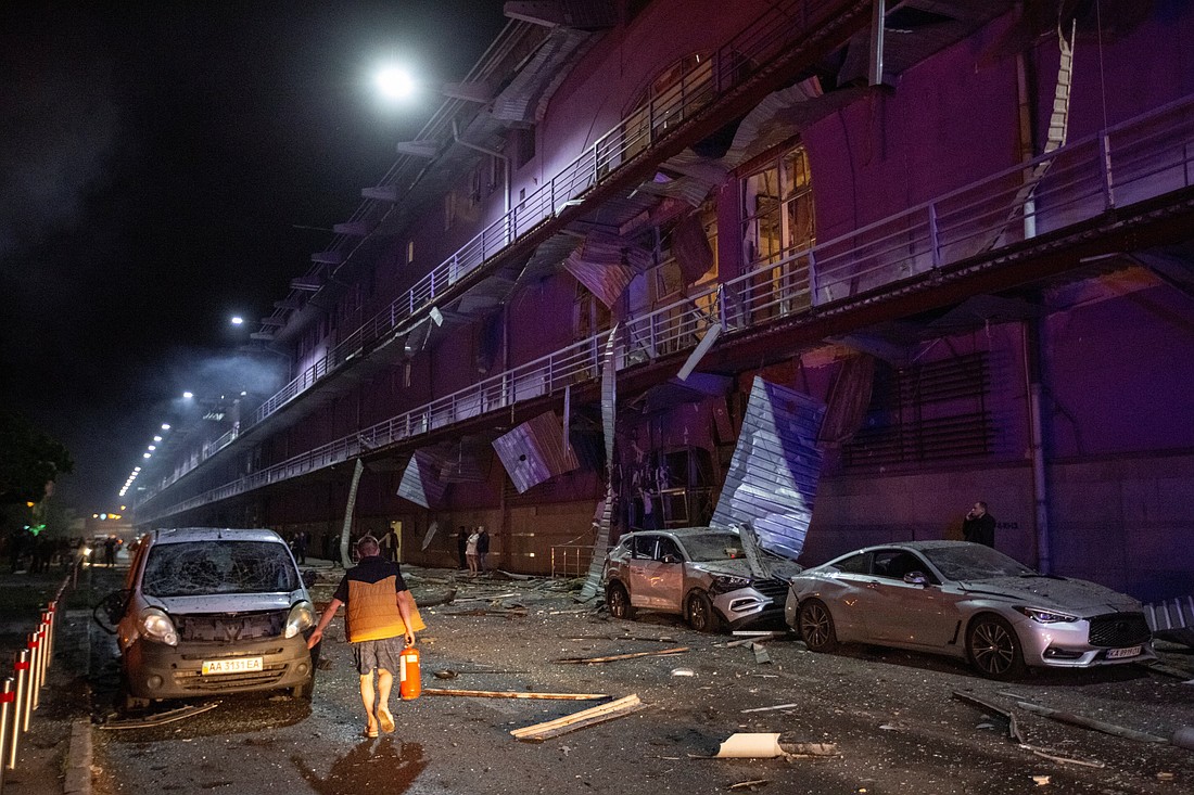 A person walks through debris at the site of a Russian drone strike in Kyiv, Ukraine, May 4, 2025. (OSV News photo/Olga Yakimovich, Reuters)