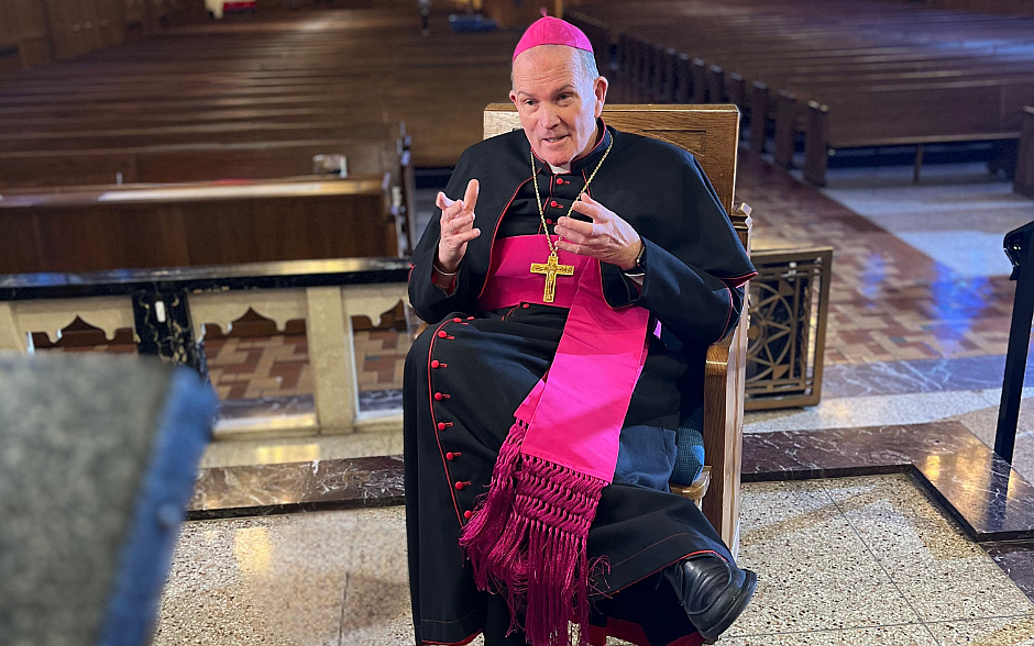The diocesan multimedia production team films Bishop O'Connell for the Annual Catholic Appeal video in St. Paul Parish, Princeton. Staff photo