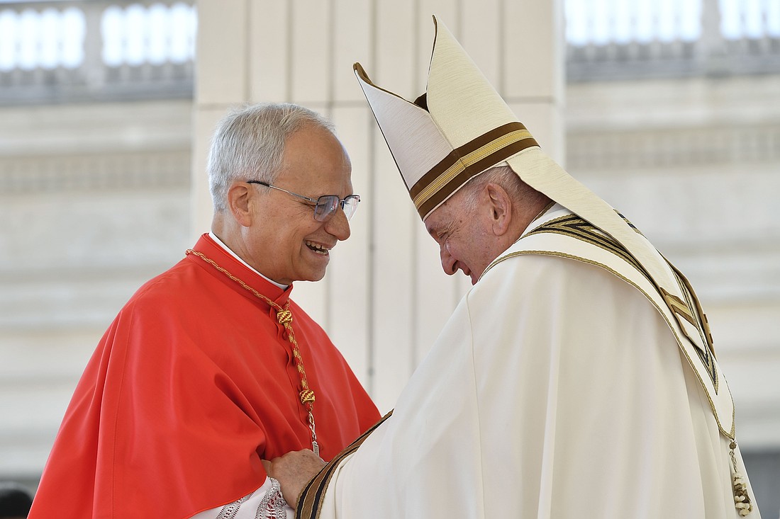 Pope Francis greets then-Cardinal Robert F. Prevost during a consistory in St. Peter's Square at the Vatican Sept. 30, 2023. U.S.-born Cardinal Prevost became the first American pope in history when he was elected at the Vatican May 8, 2025, choosing the papal name Leo XIV. He succeeded Pope Francis, who died at age 88 April 21, 2025. (CNS photo/Vatican Media)