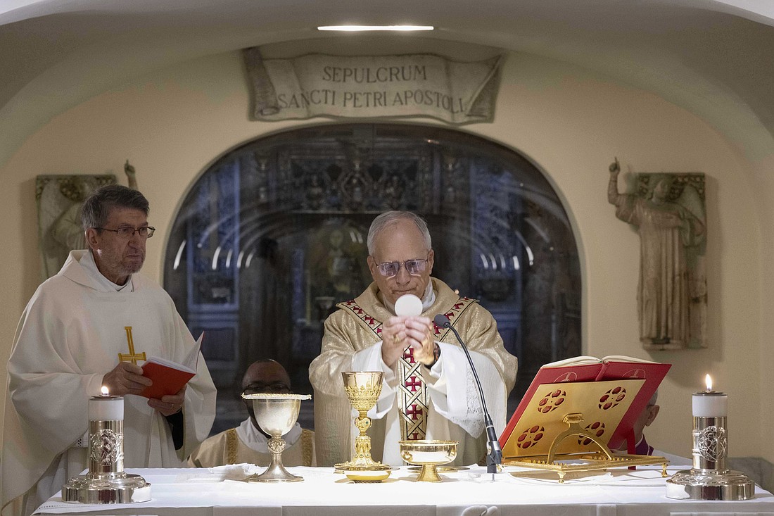 Pope Leo XIV celebrates Mass May 11, 2025, at the altar near the tomb of St. Peter's in the grotto of St. Peter's Basilica at the Vatican. Father Alejandro Moral Anton, prior general of the Order of St. Augustine, was the principal concelebrant. (CNS photo/Vatican Media)