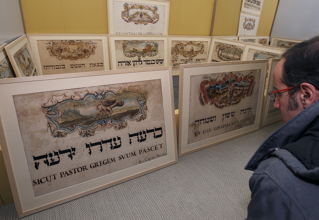 Posters made by Jewish artists in the 1700s to mark the inauguration of popes are displayed in the Jewish Museum of Rome in this file photo from January 2010. Jews have lived in Rome since long before Christ was born, and for decades they were required to participate in ceremonies to mark the enthronement of a new pope. (CNS photo/Paul Haring)
