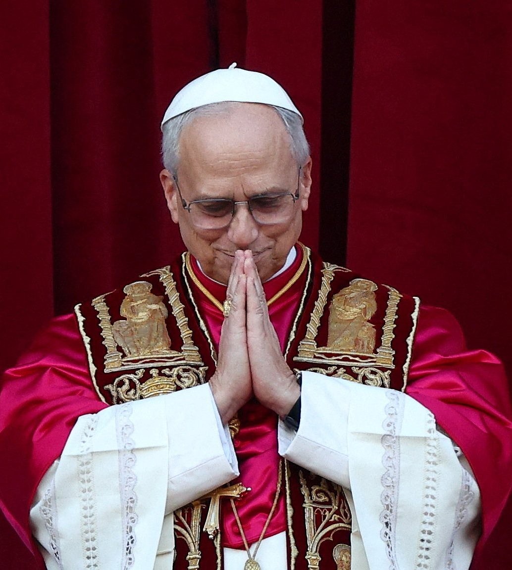 Pope Leo XIV pauses on the central balcony of St. Peter's Basilica at the Vatican May 8, 2025, following his election during the conclave. He is the first American pope in history. (OSV News photo/Guglielmo Mangiapane, Reuters)
