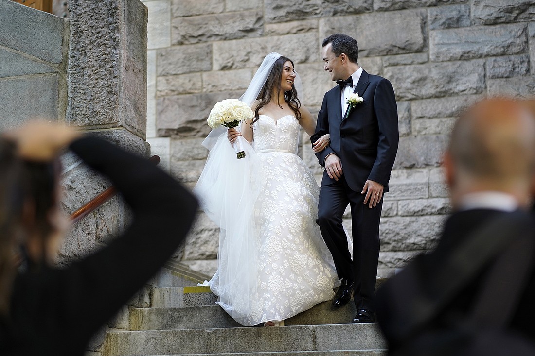 A bride and groom are seen leaving St. Paul the Apostle Church in New York City following their wedding in 2022. (OSV News photo/Gregory A. Shemitz)
