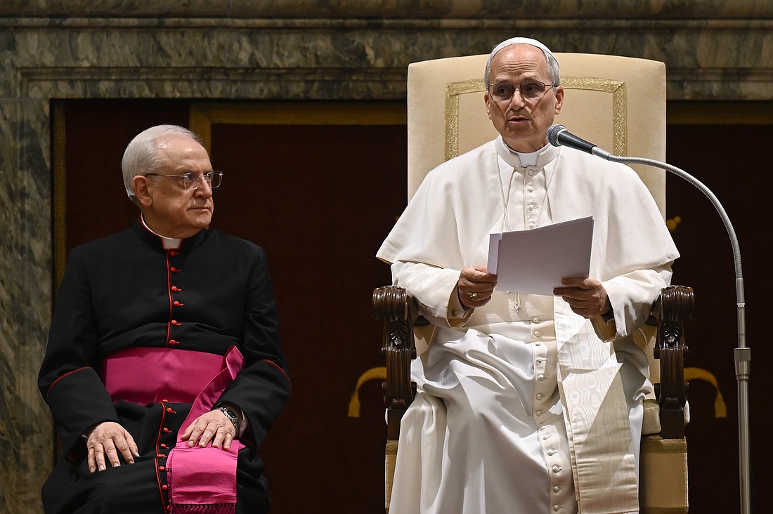 Pope Leo XIV speaks to diplomats during an audience with the Vatican diplomatic corps in the Apostolic Palace's Clemetine Hall at the Vatican May 16, 2025. Seated to the left is Msgr. Leonardo Sapienza, an official of the Prefecture of the Papal Household.(CNS photo/Vatican Media)