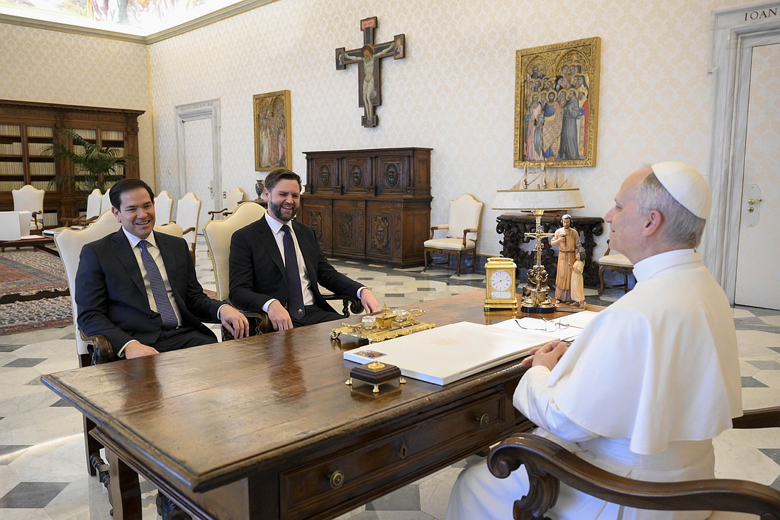 Pope Leo XIV meets with U.S. Vice President JD Vance (right) and Secretary of State Marco Rubio (left) in the library of the Apostolic Palace at the Vatican May 19, 2025. (CNS photo/Vatican Media)