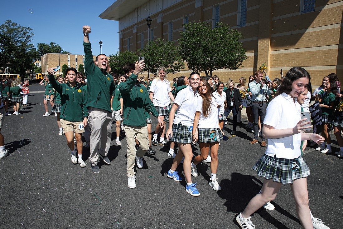 RBC seniors are all smiles during their Senior Clap Out event. John Batkowski photo