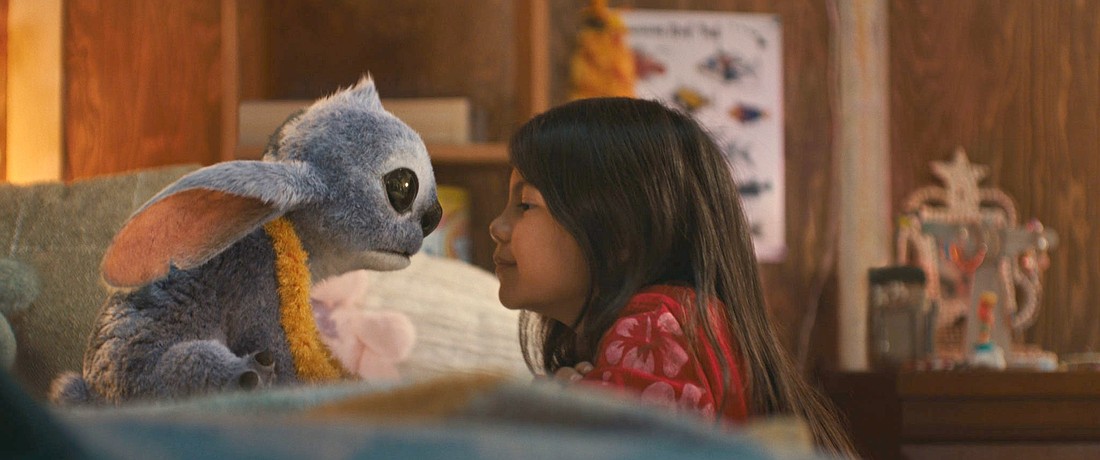 Animated character Stitch, voiced by Chris Sanders, and Maia Kealoha as Lilo are pictured in a scene from the movie "Lilo & Stitch." The OSV News classification is A-II -- adults and adolescents. The Motion Picture Association of America rating is PG -- parental guidance suggested. (OSV News photo/Disney. © 2025 Disney Enterprises Inc.)