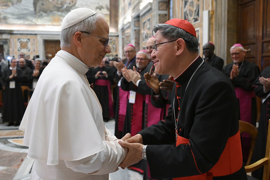 Pope Leo XIV greets Cardinal Luis Antonio Tagle, pro-prefect of the Dicastery for Evangelization, during a meeting with the national directors of the Pontifical Mission Societies in the Vatican's Clementine Hall May 22, 2025. (CNS photo/Vatican Media)