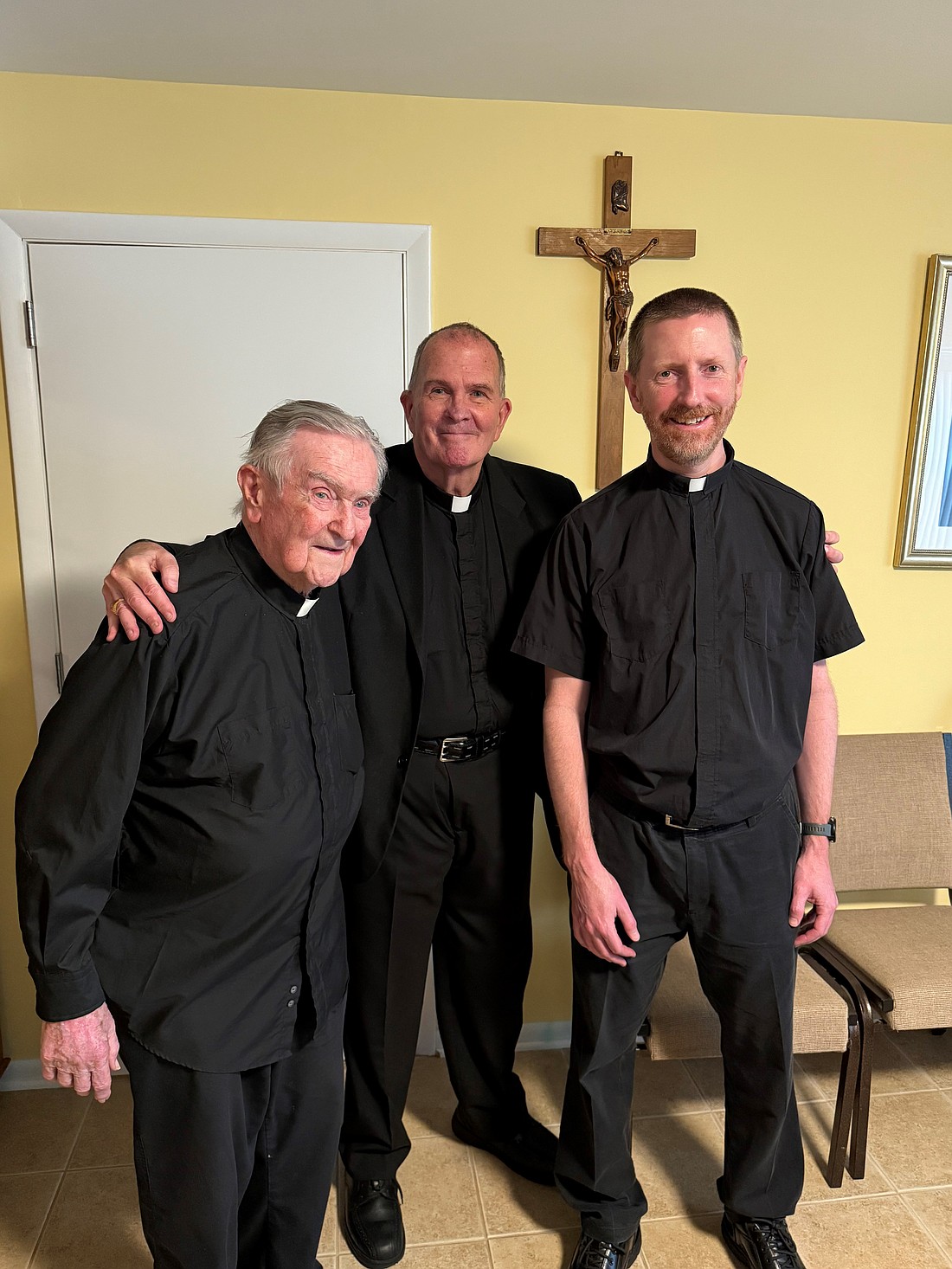 Bishop O'Connell, center, poses for a photo with Father George Deutsch, left, a retired priest of the Diocese, and Father Jim O'Neill, pastor of St. John Parish, Lakehurst. Father Deutsch turns 96 on May 31 and on May 25 he marked 68 years of priesthood. Staff photo