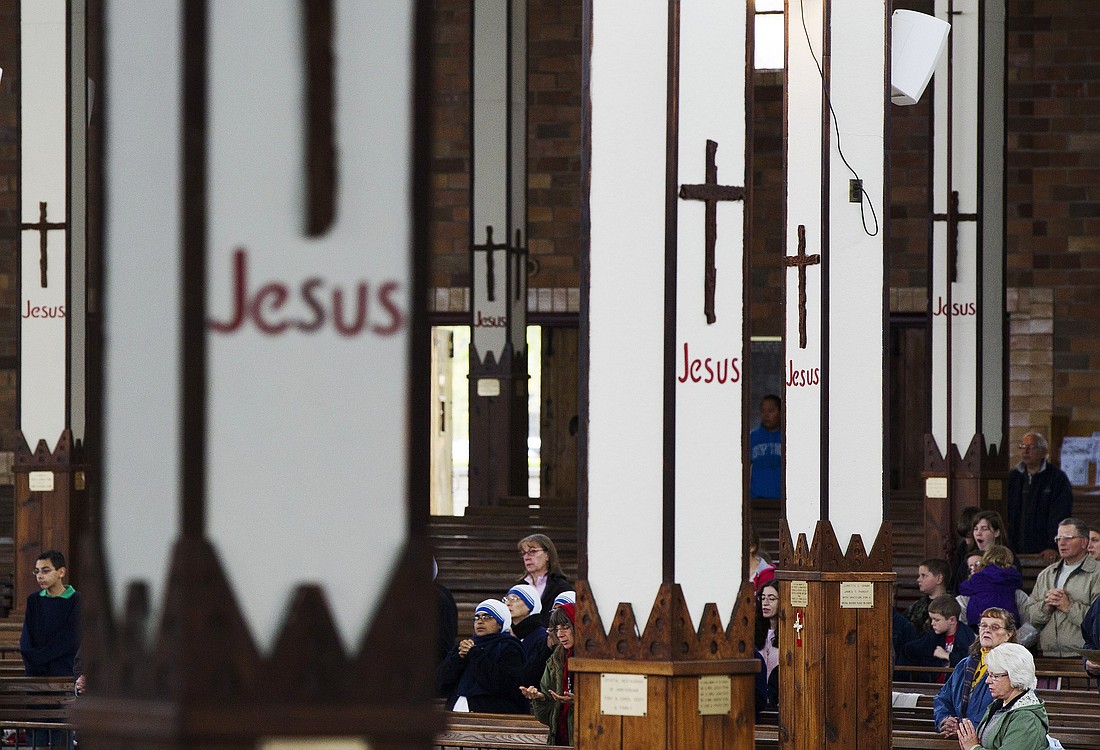 People are pictured in a file photo praying during Mass marking the end of the 73rd Tekakwitha Conference at the Shrine of Our Lady of Martyrs in Auriesville, N.Y., the birthplace of St. Kateri Tekakwitha. (OSV News photo/Lucas Jackson, Reuters)