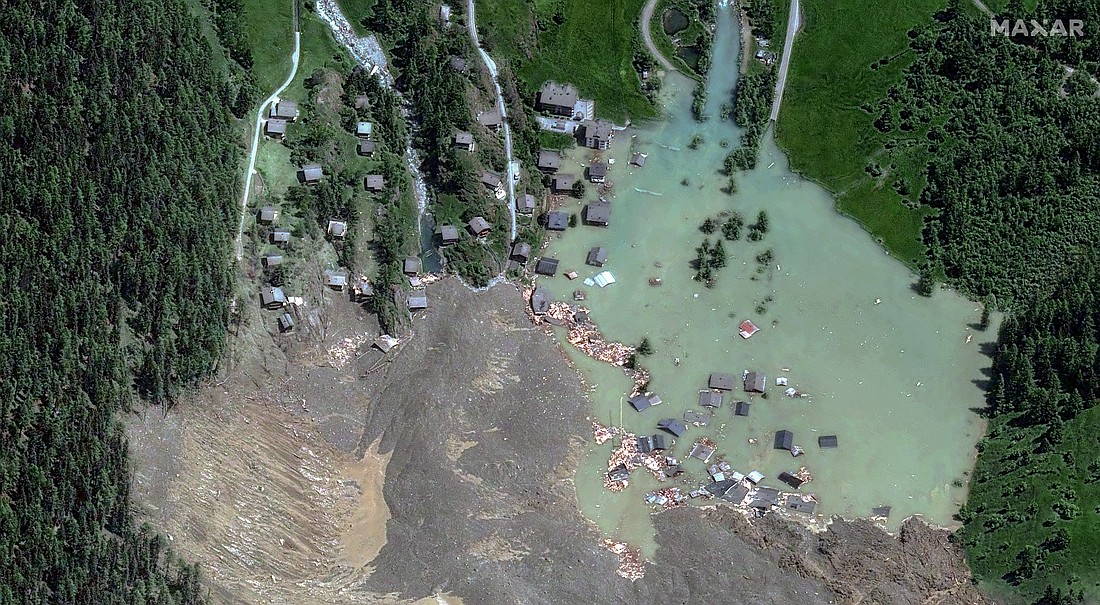 A satellite image shows the closer view of destroyed houses and blocked Ionza River May 29, 2025, after a glacier in the Swiss Alps partially collapsed and tumbled onto the village, in Blatten, Switzerland. The search for a missing 64-year-old man was suspended May 29 because of unsafe conditions after a huge mass of rock and ice from a glacier crashed down a Swiss mountainside the day before.  (OSV News photo/Maxar Technologies handout via Reuters) Editors: THIS IMAGE HAS BEEN SUPPLIED BY A THIRD PARTY. NO RESALES. NO ARCHIVES. MANDATORY CREDIT.  MUST NOT OBSCURE LOGO..