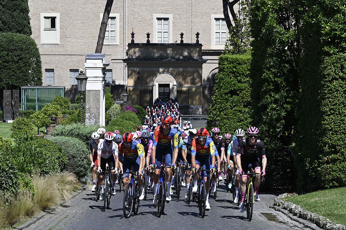 Cyclists participating in the Giro d’Italia ride through the Vatican Gardens after greeting Pope Leo XIV during a special passage through Vatican City June 1, 2025. (CNS photo/Vatican Media)