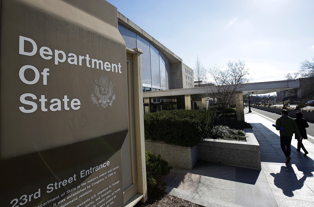People are pictured in a file photo entering the U.S. Department of State building in Washington. After the Trump administration ordered U.S. embassies throughout the world to pause further appointments for student visas, Secretary of State Marco Rubio on May 27, 2025, indicated the measures would remain in place "until further guidance is issued." (OSV News photo/Joshua Roberts, Reuters)