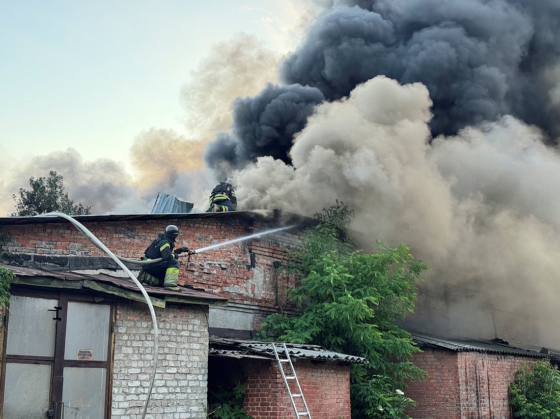 Firefighters work at the site of the Russian drone strike, amid Russia's attack in Kharkiv, Ukraine, June 4, 2025. Pope Leo XIV and Russian leader Vladimir Putin held their first telephone conversation June 4 with the pope encouraging Putin to make a gesture to show he is serious about peace with Ukraine, the Vatican press office said. OSV News photo/Vitalii Hnidyi, Reuters